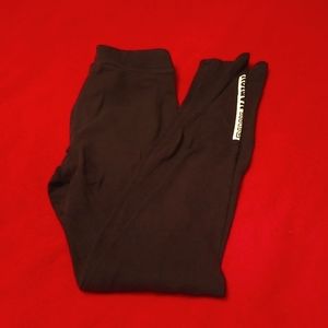 PiNK leggings, black, size SP, with Pink Nation wording at bottom of one leg